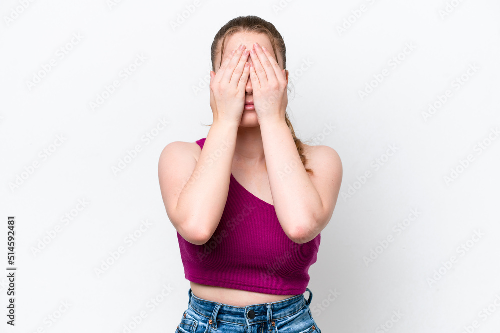 Young caucasian girl isolated on white background covering eyes by hands Young caucasian girl isolated on white background covering eyes by hands