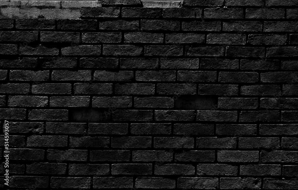 Old Black Brick wall is a block texture background for design and decoration.
