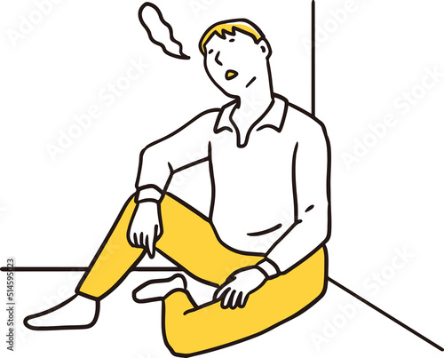 疲れ果てて座り込む男性
