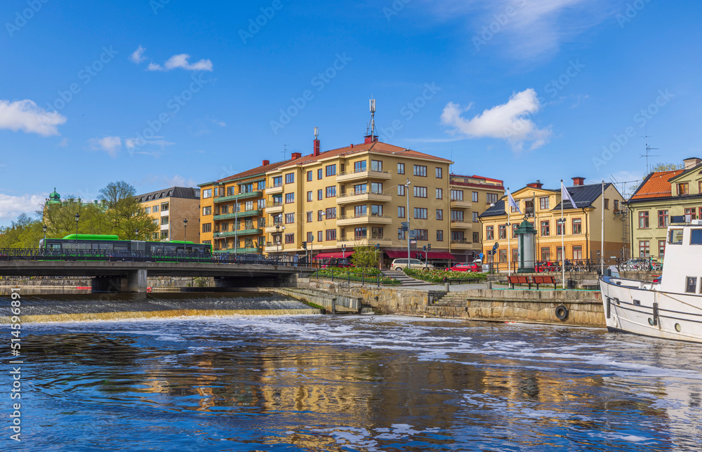 Beautiful view of central part of city of Uppsala with river and bridge on sunny summer day. Sweden. Beautiful view of central part of city of Uppsala with river and bridge on sunny summer day. Sweden.
