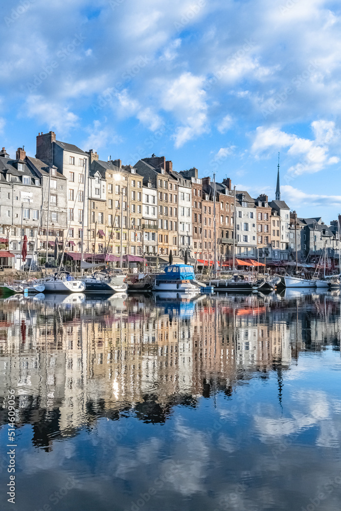 Honfleur, beautiful city in France, the harbor in the morning, reflection on the river
