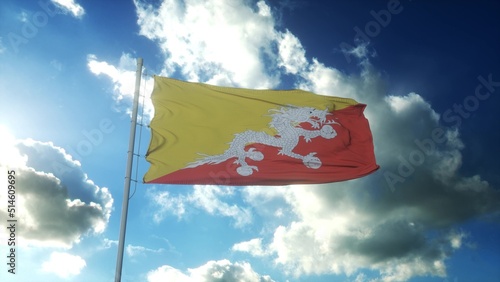 Flag of Bhutan waving at wind against beautiful blue sky. 3d rendering photo