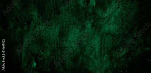 Dark green concrete wall for background. Antique dark green stone concrete texture.