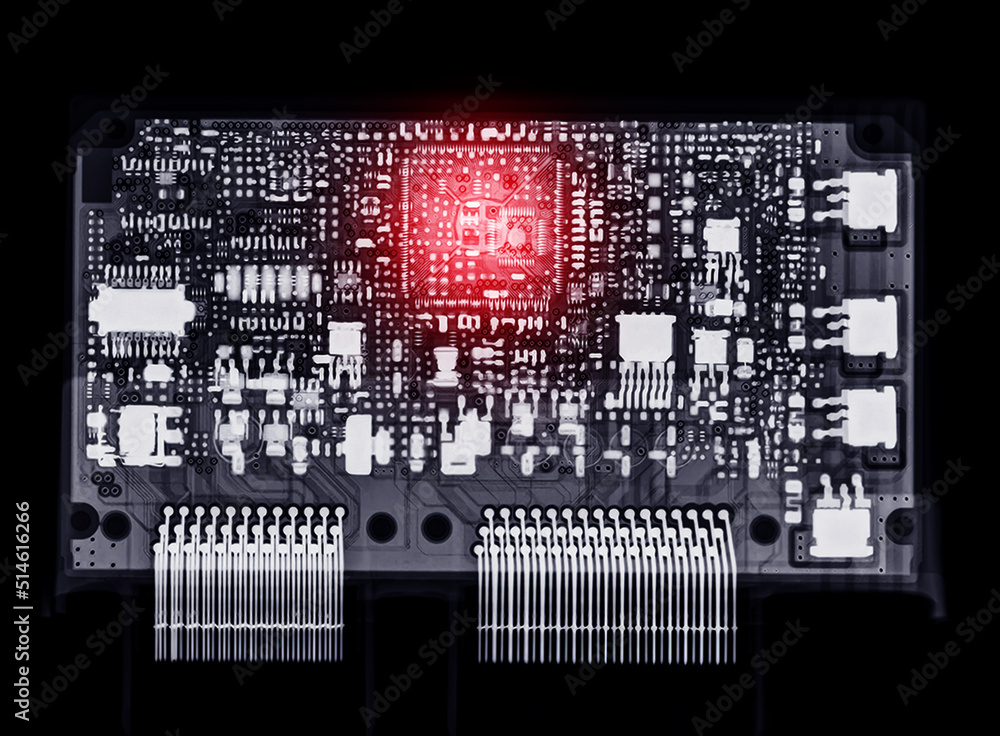 X-ray image of engine control unit or ECU . X-ray image of engine control unit or ECU .