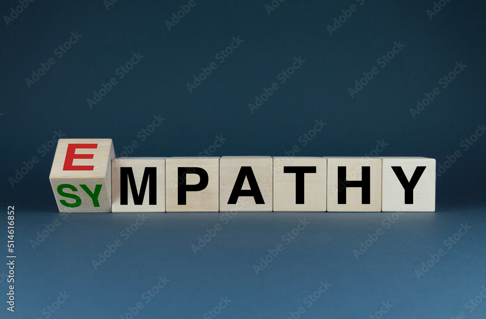 Obraz premium Sympathy or Empathy. Cubes form the words Sympathy or Empathy.