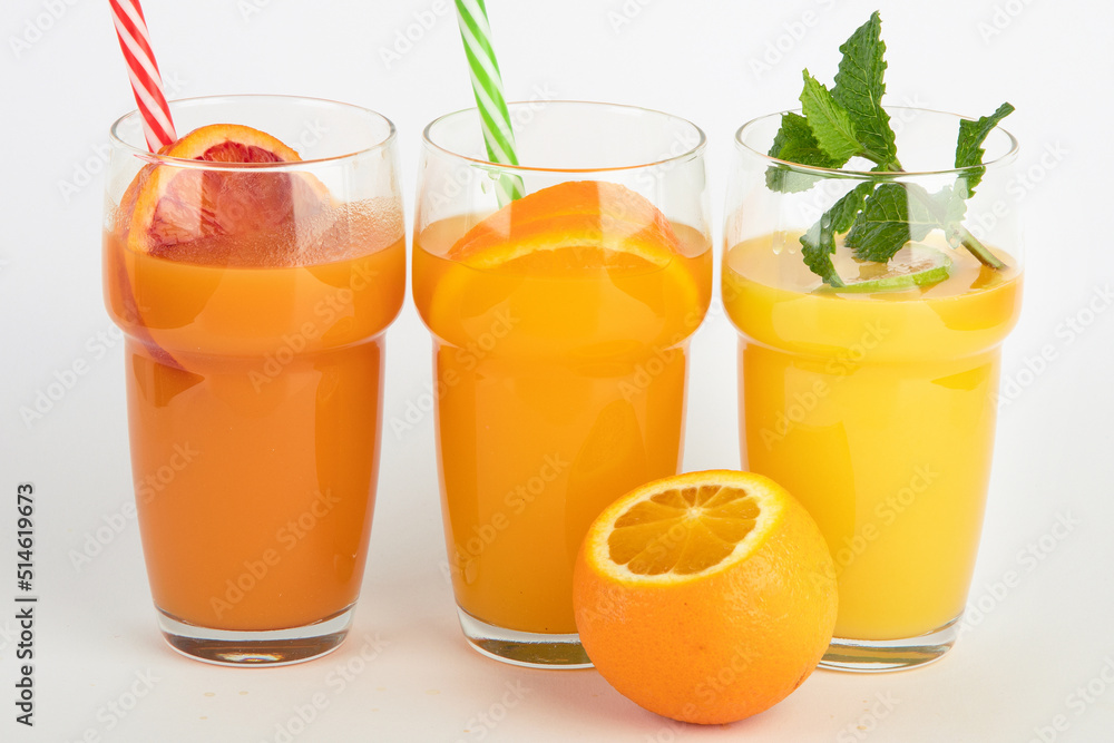 Fototapeta premium Fruit juices assortment on light background.