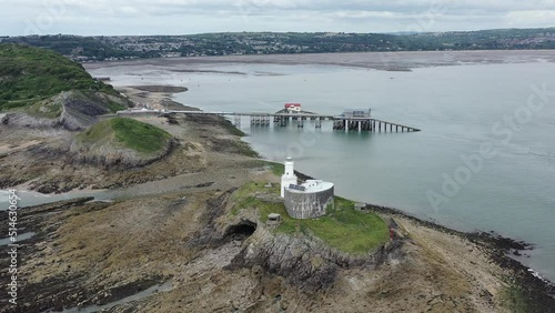 Mumbles Lighthouse and Pier, part of the Gower coastline in South Wales photo