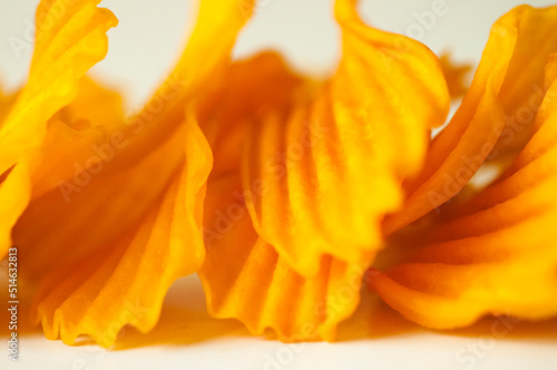 close-up, golden yellow, sweet potato chips, white background