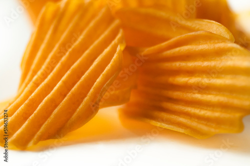close-up, golden yellow, sweet potato chips, white background