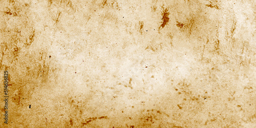 Old paper texture background, old  brown paper parchment background design with distressed vintage stains and ink spatter and white faded shabby center.