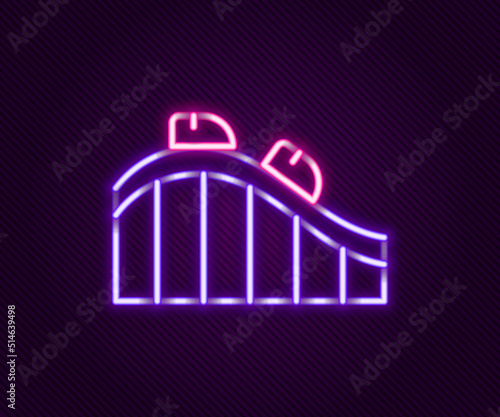 Glowing neon line Roller coaster icon isolated on black background. Amusement park. Childrens entertainment playground, recreation park. Colorful outline concept. Vector
