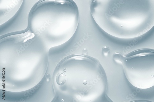 Tableau sur toile Cosmetic gray lotion transparent gel drops texture background