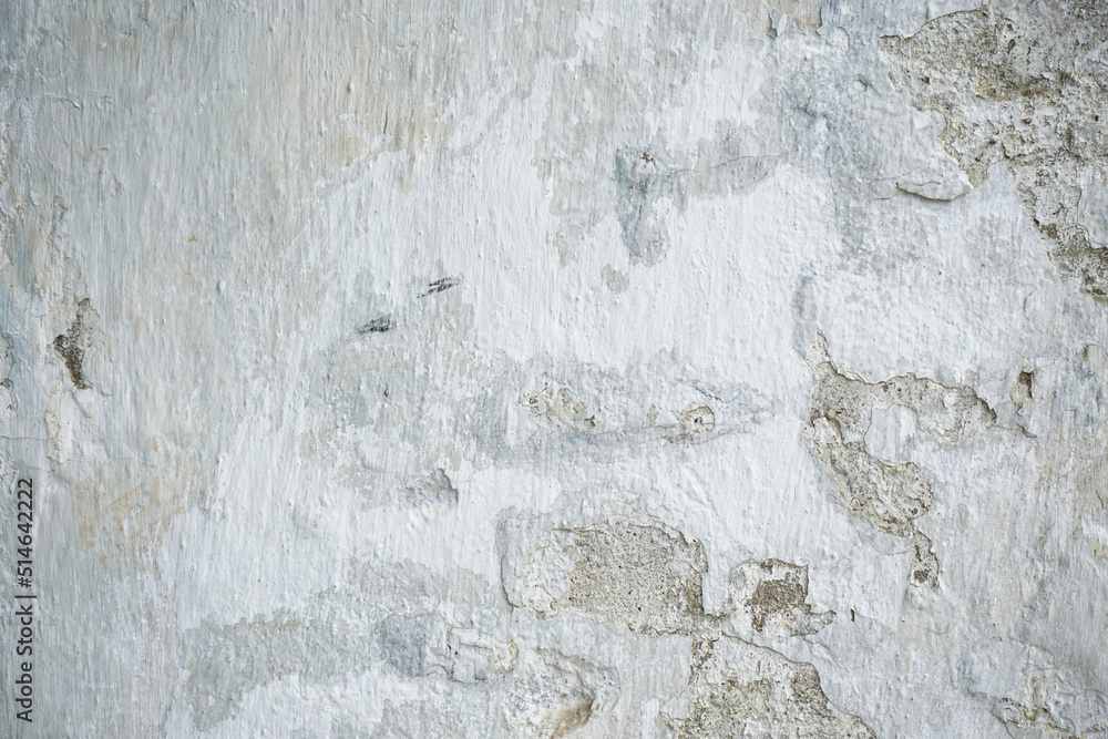 Obraz premium Old white painted limewashed plaster wall texture or background. Close-up.