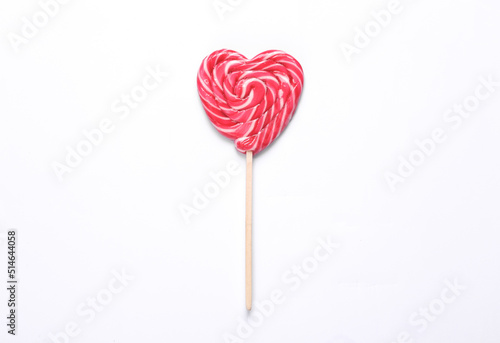 Heart shaped lollipop isolated on white background