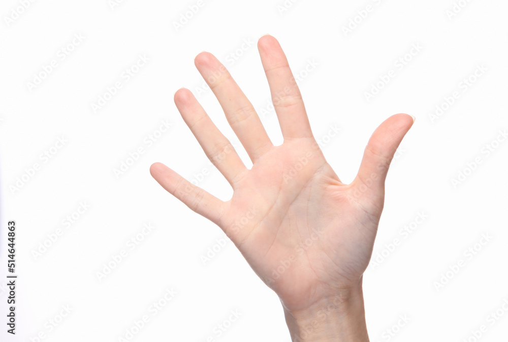 Female hand shows five fingers isolated on white background. Female hand shows five fingers isolated on white background.