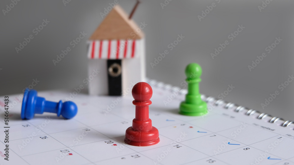 close up of calendar on the table, planning for a business meeting or travel planning concept, pin on calendar, copy space close up of calendar on the table, planning for a business meeting or travel planning concept, pin on calendar, copy space