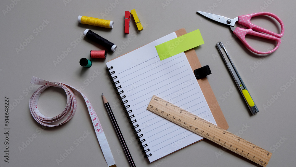 Accessories for tailoring on fabric. Tailoring of designer clothes Accessories for tailoring on fabric. Tailoring of designer clothes