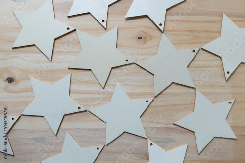 star ornaments on a wooden background