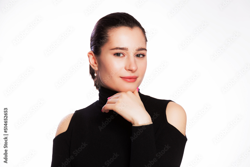Woman with short hair and clean skin. Face close up, skin beauty tanned, beautiful smile woman in black turtleneck over white background Woman with short hair and clean skin. Face close up, skin beauty tanned, beautiful smile woman in black turtleneck over white background