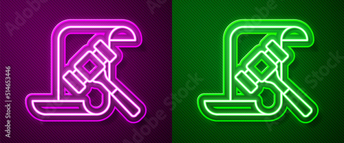 Glowing neon line Auction hammer icon isolated on purple and green background. Gavel - hammer of judge or auctioneer. Bidding process, deal done. Auction bidding. Vector