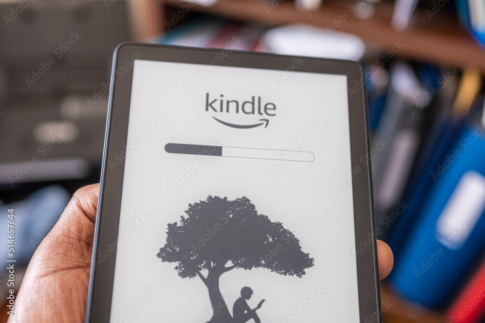 1 July 2022 - Calgary, Alberta Canada - Amazon kindle tablet for reading  books running an update Stock Photo | Adobe Stock