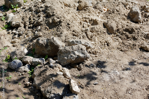 A pile of soil heaped up during gardening