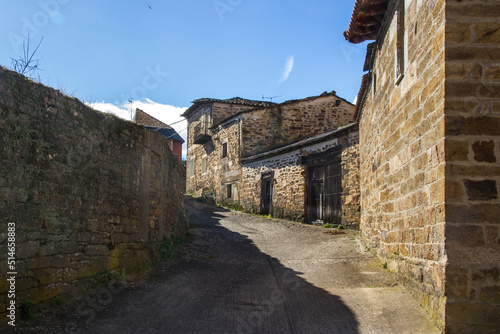 Street of the Town of Villardeciervos with old stone constructions, Zamora. Spain  photo