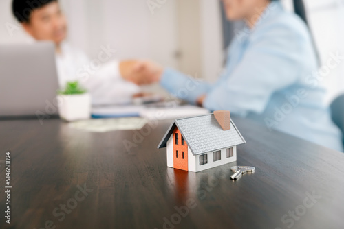 Real estate brokers or real estate agent with client or architect team Discussions about contracts , Saving money to invest in house or property in the future. Business property Concept.