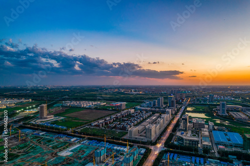 Aerial shot of city high-rise in the evening