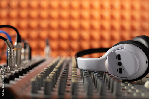Headphones and sound mixer radio station. Music concept sound record studio