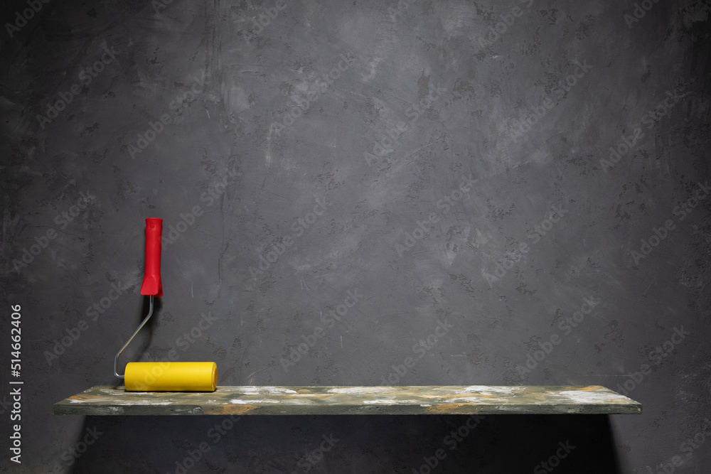 Construction tool on shelf on wall. Construction concept renovation and used work tool Construction tool on shelf on wall. Construction concept renovation and used work tool
