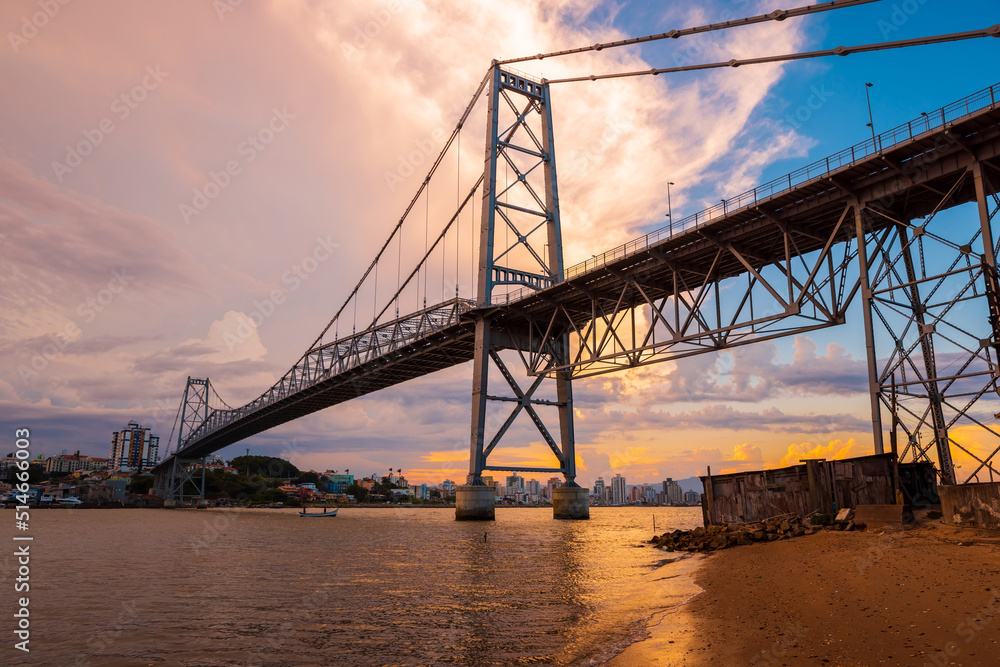 Hercilio luz cable stayed bridge with sunset sky in Florianopolis Hercilio luz cable stayed bridge with sunset sky in Florianopolis