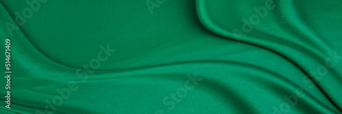 Wallpaper Mural Black green satin dark fabric texture luxurious shiny that is abstract silk cloth panorama background with patterns soft waves blur beautiful. Torontodigital.ca