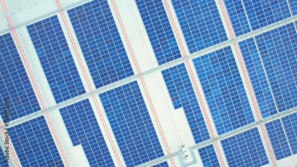 Top view of a solar power station on building roof, Renewable green energy. Clean energy industry in Nonthaburi, Thailand. drone footage. 4k
Top view of a solar power station on building roof, Renewable green energy. Clean energy industry in Nonthaburi, Thailand. drone footage. 4k