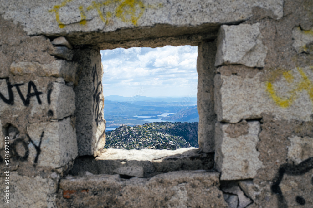 View of the landscape through a stone window
