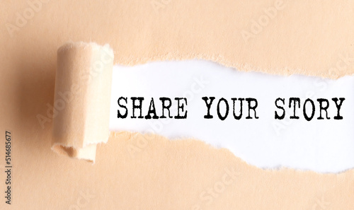 The text SHARE YOUR STORY appears on torn paper on white background.