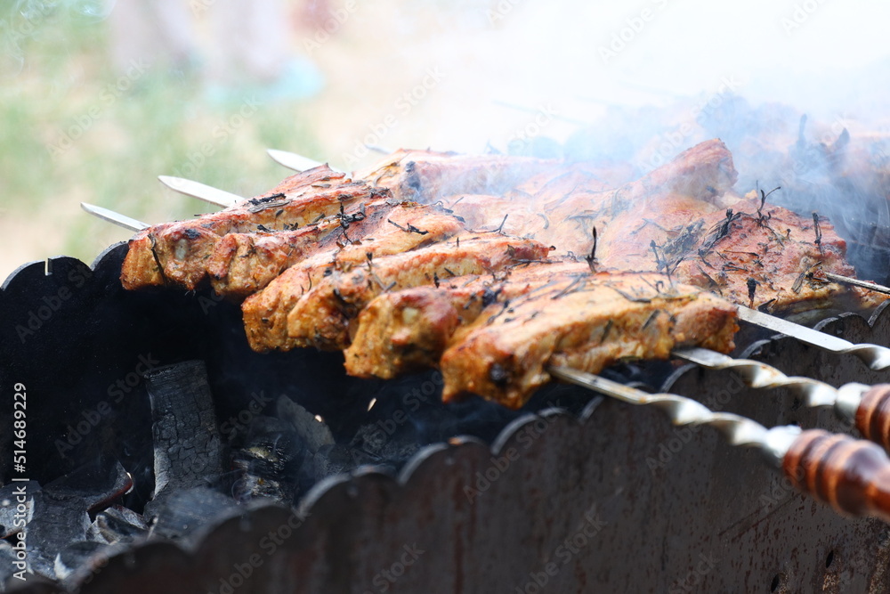 A photo of barbecue on the grill is being prepared A photo of barbecue on the grill is being prepared