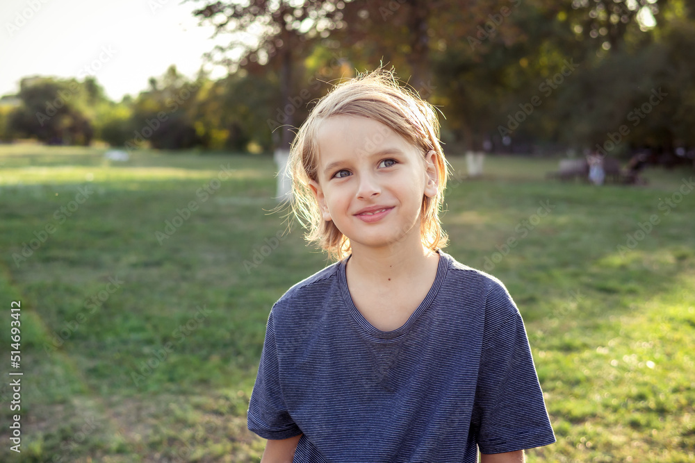 Teenger blonde boy outdoor park lifestyle portrait Teenger blonde boy outdoor park lifestyle portrait