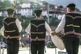 Unidentified Macedonian musicians in traditional costumes perform at folk music festival in Northern Macedonia.