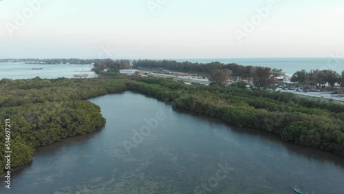 Aerial view over wetland and couple is kayaking