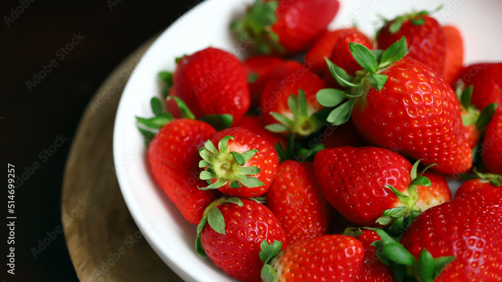 Fresh ripe strawberries in a bowl. Strawberry season. Fresh ripe strawberries in a bowl. Strawberry season.