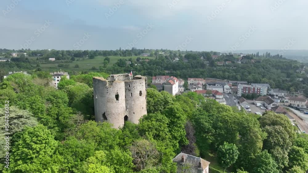 Aerial panning show of medieval castle above Etampes France with four concentric towers Aerial panning show of medieval castle above Etampes France with four concentric towers