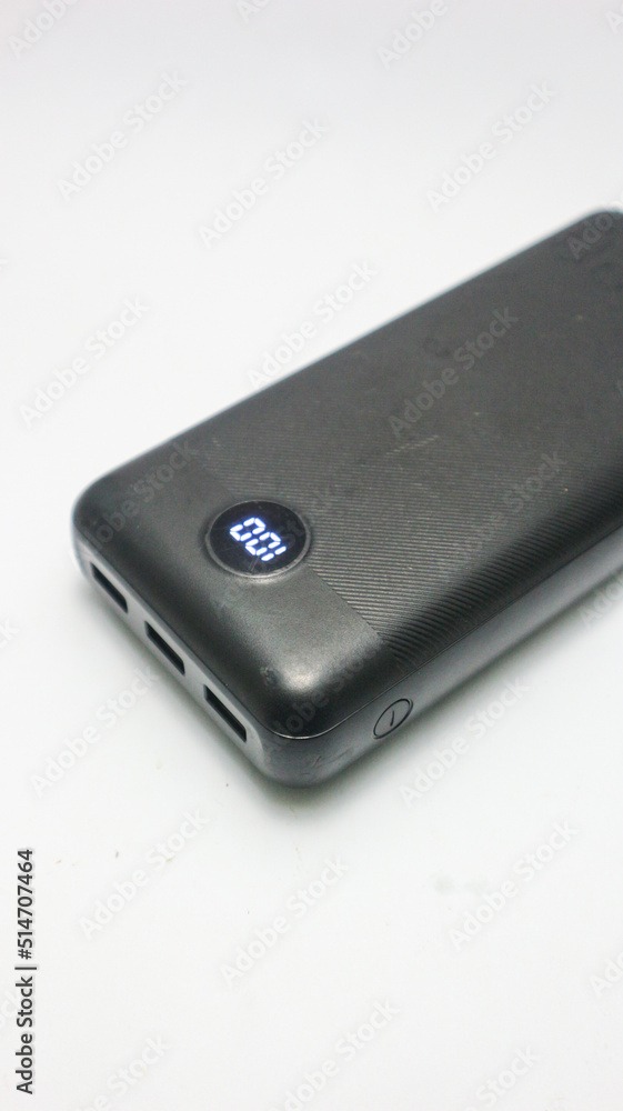 Powerbank new, powerful dark color with two usb inputs on a white background
Powerbank new, powerful dark color with two usb inputs on a white background