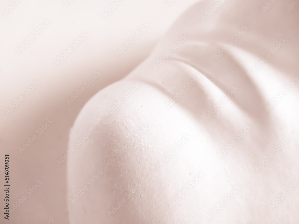 close-up of white minimalist body mask close-up of white minimalist body mask