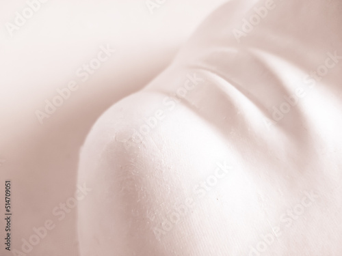 close-up of white minimalist body mask