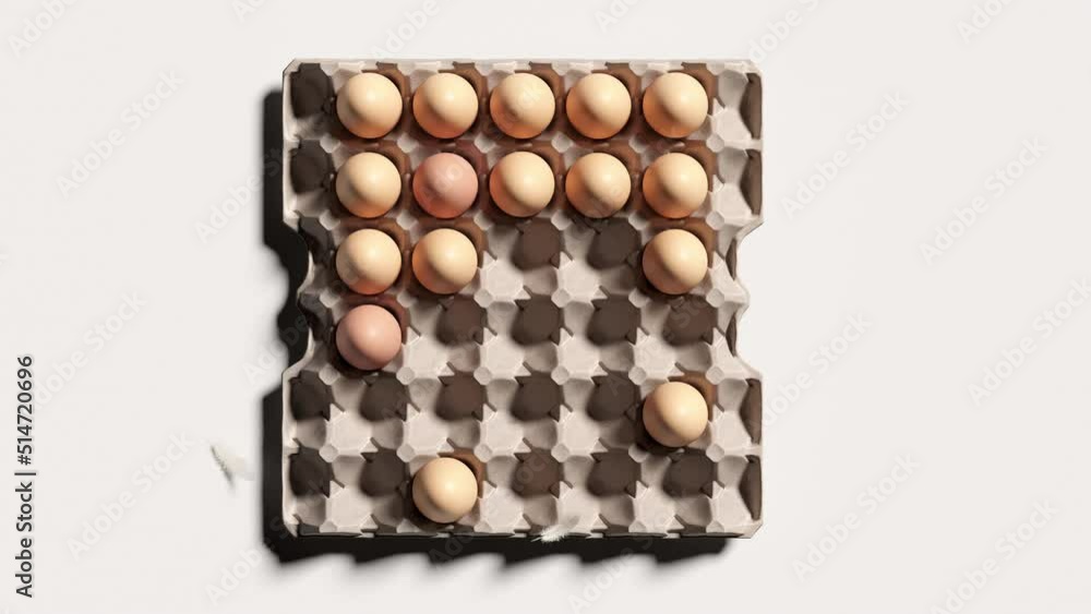 Vibrant, Eggs on a white background. Stop motion animation of Easter eggs Christmas concept idea. Top view. Vibrant, Eggs on a white background. Stop motion animation of Easter eggs Christmas concept idea. Top view.