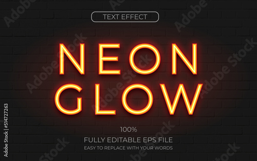 Neon text effect shades of orange on brick background