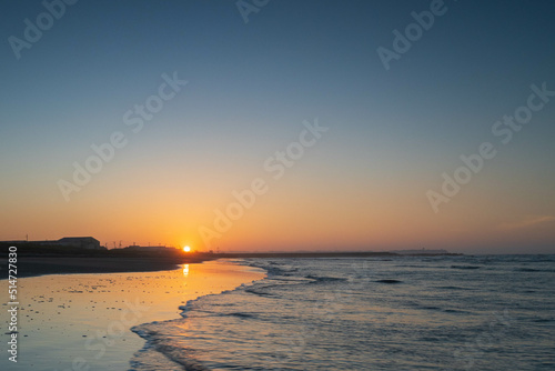 Sunset sky clouds background. Beautiful landscape with clouds and orange sun on sky. High quality photo