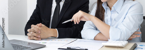 Brainstorm team, Marketers and financial accountants are discussing and analyzing charts to plan strategies to meet customer needs, Computer technology for business concept.