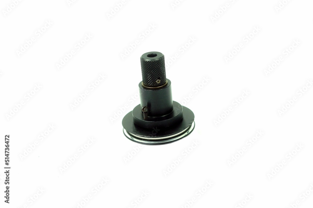 A flywheel shaft drive a film magazine of a camera on white backgrounds. A flywheel shaft drive a film magazine of a camera on white backgrounds.